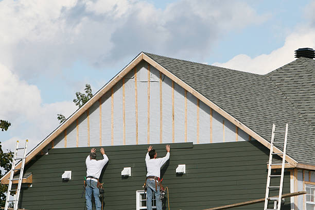 Professional Siding Installation technician working in Richwood, WV